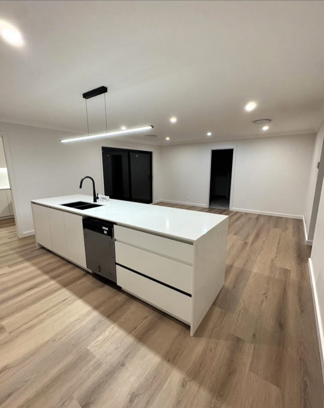 Spotless modern kitchen with white island