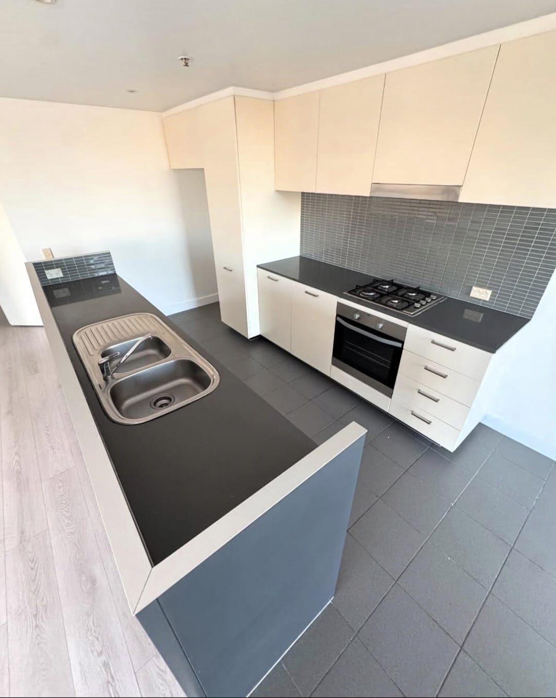 Kitchen with clean dark countertops